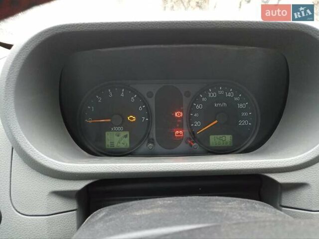 Червоний Форд Фьюжен, об'ємом двигуна 1.39 л та пробігом 150 тис. км за 4200 $, фото 9 на Automoto.ua