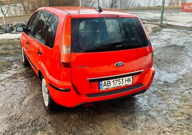 Красный Форд Фьюжн, объемом двигателя 1.4 л и пробегом 298 тыс. км за 3850 $, фото 8 на Automoto.ua