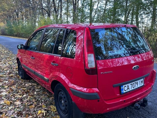 Красный Форд Фьюжн, объемом двигателя 1.4 л и пробегом 132 тыс. км за 4200 $, фото 4 на Automoto.ua