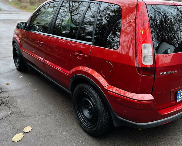 Красный Форд Фьюжн, объемом двигателя 1.4 л и пробегом 219 тыс. км за 5150 $, фото 9 на Automoto.ua