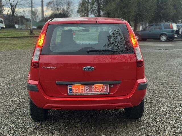 Красный Форд Фьюжн, объемом двигателя 1.4 л и пробегом 195 тыс. км за 4750 $, фото 9 на Automoto.ua