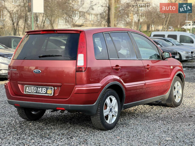 Красный Форд Фьюжн, объемом двигателя 1.39 л и пробегом 194 тыс. км за 4500 $, фото 9 на Automoto.ua