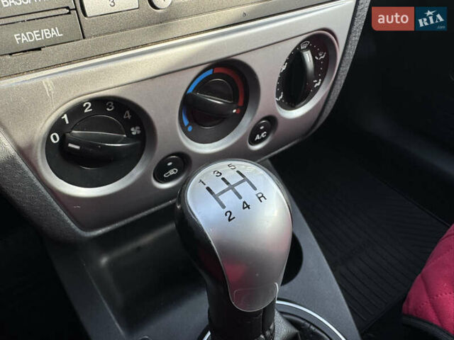 Красный Форд Фьюжн, объемом двигателя 1.39 л и пробегом 194 тыс. км за 4500 $, фото 21 на Automoto.ua