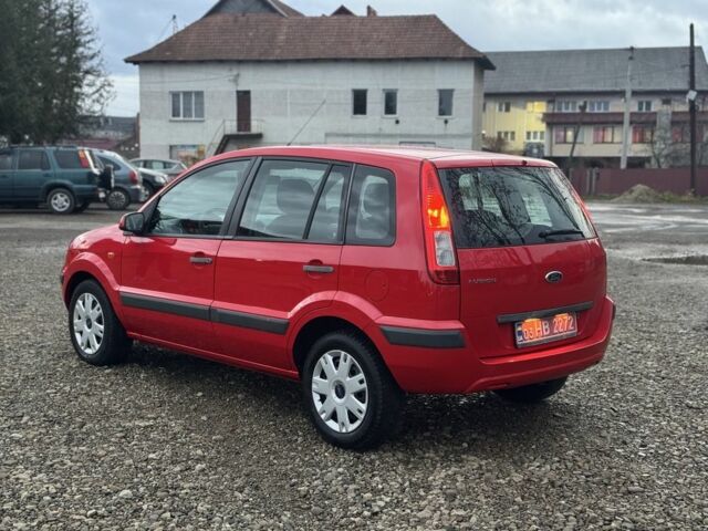 Красный Форд Фьюжн, объемом двигателя 1.4 л и пробегом 195 тыс. км за 4750 $, фото 7 на Automoto.ua