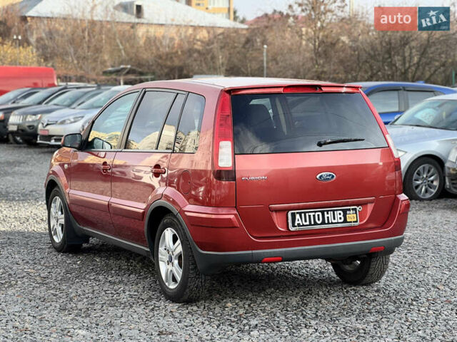 Красный Форд Фьюжн, объемом двигателя 1.39 л и пробегом 194 тыс. км за 4500 $, фото 6 на Automoto.ua