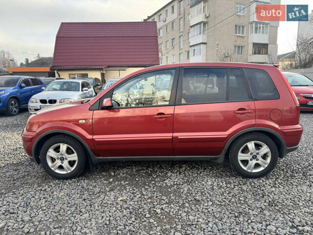 Красный Форд Фьюжн, объемом двигателя 1.39 л и пробегом 194 тыс. км за 4500 $, фото 5 на Automoto.ua