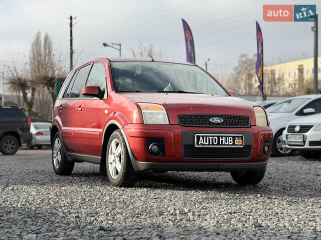 Красный Форд Фьюжн, объемом двигателя 1.39 л и пробегом 194 тыс. км за 4500 $, фото 2 на Automoto.ua