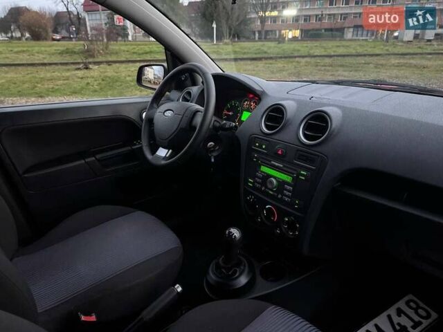 Красный Форд Фьюжн, объемом двигателя 1.4 л и пробегом 197 тыс. км за 4850 $, фото 20 на Automoto.ua