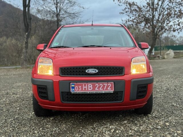 Красный Форд Фьюжн, объемом двигателя 1.4 л и пробегом 195 тыс. км за 4750 $, фото 5 на Automoto.ua