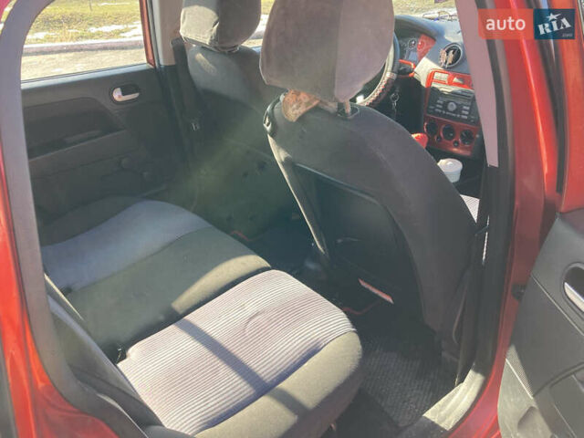 Красный Форд Фьюжн, объемом двигателя 1.4 л и пробегом 152 тыс. км за 4500 $, фото 10 на Automoto.ua