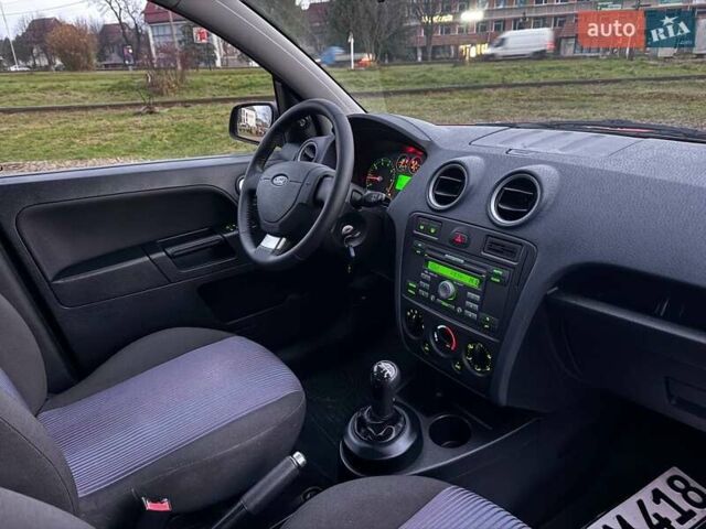 Красный Форд Фьюжн, объемом двигателя 1.4 л и пробегом 197 тыс. км за 4850 $, фото 18 на Automoto.ua