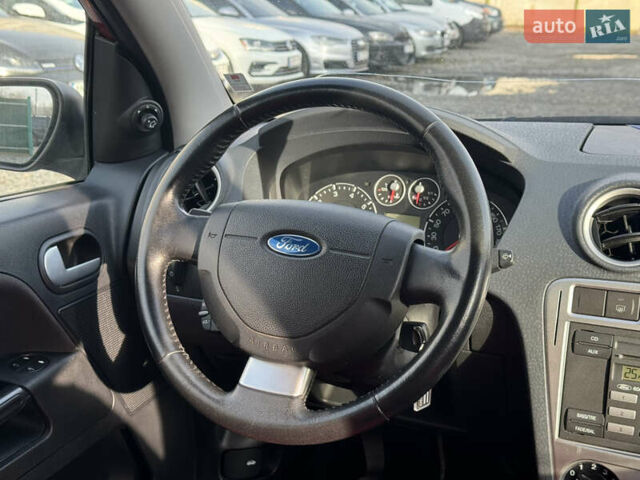 Красный Форд Фьюжн, объемом двигателя 1.39 л и пробегом 194 тыс. км за 4500 $, фото 17 на Automoto.ua