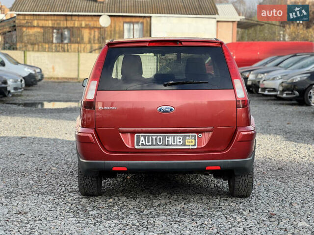 Красный Форд Фьюжн, объемом двигателя 1.39 л и пробегом 194 тыс. км за 4500 $, фото 8 на Automoto.ua