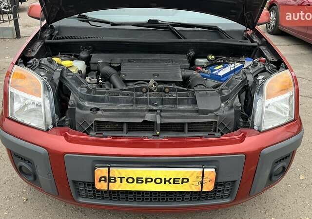 Красный Форд Фьюжн, объемом двигателя 1.39 л и пробегом 131 тыс. км за 5500 $, фото 18 на Automoto.ua