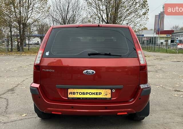 Красный Форд Фьюжн, объемом двигателя 1.39 л и пробегом 131 тыс. км за 5500 $, фото 7 на Automoto.ua