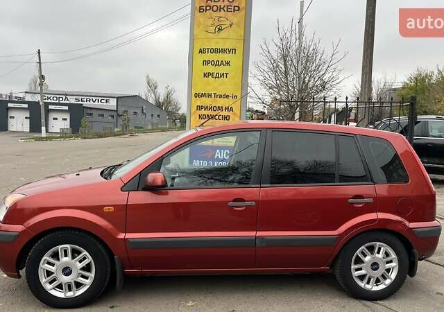 Красный Форд Фьюжн, объемом двигателя 1.39 л и пробегом 131 тыс. км за 5500 $, фото 4 на Automoto.ua