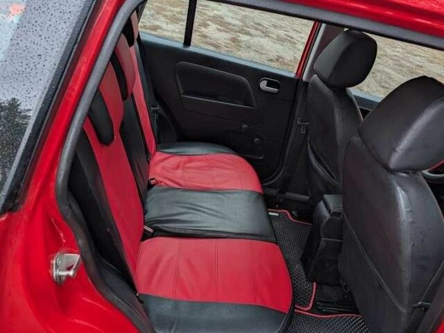 Красный Форд Фьюжн, объемом двигателя 1.6 л и пробегом 300 тыс. км за 5100 $, фото 8 на Automoto.ua