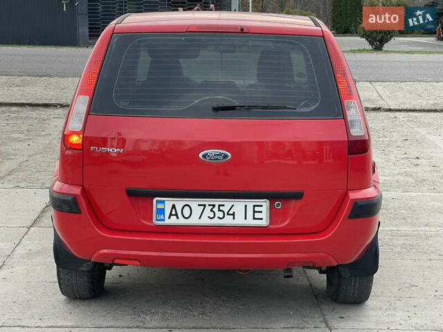Червоний Форд Фьюжен, об'ємом двигуна 1.2 л та пробігом 210 тис. км за 3950 $, фото 8 на Automoto.ua