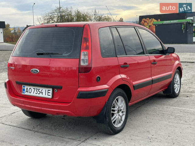 Червоний Форд Фьюжен, об'ємом двигуна 1.2 л та пробігом 210 тис. км за 3950 $, фото 9 на Automoto.ua