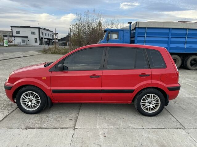 Червоний Форд Фьюжен, об'ємом двигуна 1.2 л та пробігом 210 тис. км за 3950 $, фото 4 на Automoto.ua