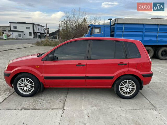 Червоний Форд Фьюжен, об'ємом двигуна 1.2 л та пробігом 210 тис. км за 3950 $, фото 7 на Automoto.ua