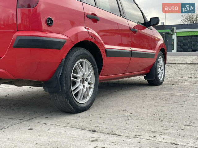 Червоний Форд Фьюжен, об'ємом двигуна 1.2 л та пробігом 210 тис. км за 3950 $, фото 10 на Automoto.ua