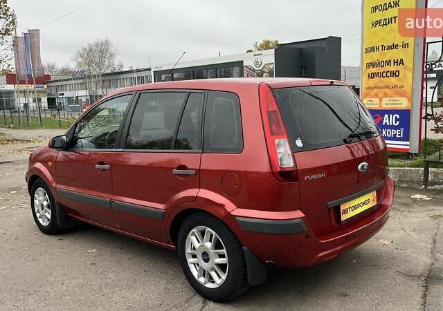 Красный Форд Фьюжн, объемом двигателя 1.39 л и пробегом 131 тыс. км за 5500 $, фото 5 на Automoto.ua