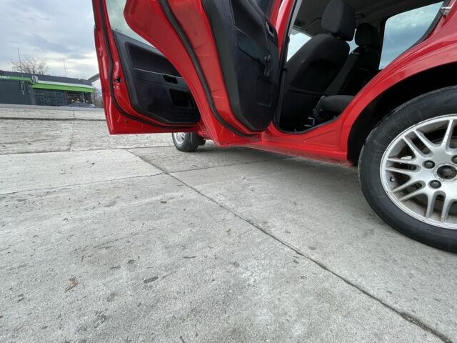 Червоний Форд Фьюжен, об'ємом двигуна 1.2 л та пробігом 210 тис. км за 3950 $, фото 10 на Automoto.ua