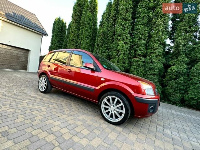 Красный Форд Фьюжн, объемом двигателя 1.4 л и пробегом 129 тыс. км за 6100 $, фото 22 на Automoto.ua