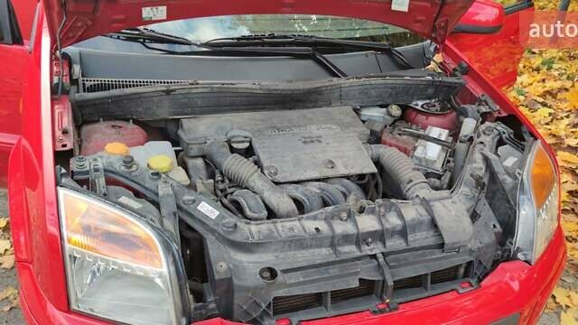 Форд Фьюжен 2011 у Львові на Automoto.ua Червоний Форд Фьюжен, об'ємом двигуна 1.4 л та пробігом 122 тис. км за 4900 $, фото 16 на Automoto.ua