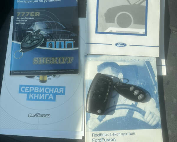 Червоний Форд Фьюжен, об'ємом двигуна 1.6 л та пробігом 149 тис. км за 6500 $, фото 8 на Automoto.ua