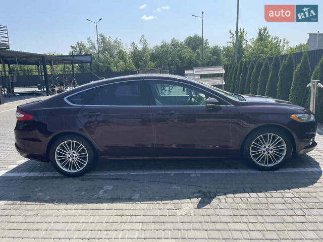 Красный Форд Фьюжн, объемом двигателя 2 л и пробегом 288 тыс. км за 9600 $, фото 1 на Automoto.ua