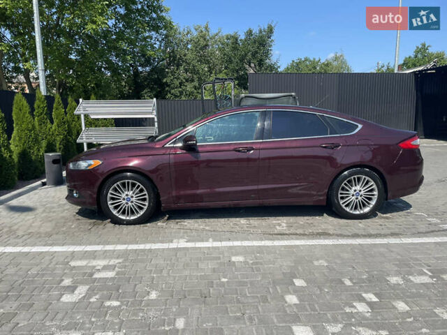 Красный Форд Фьюжн, объемом двигателя 2 л и пробегом 288 тыс. км за 9600 $, фото 4 на Automoto.ua