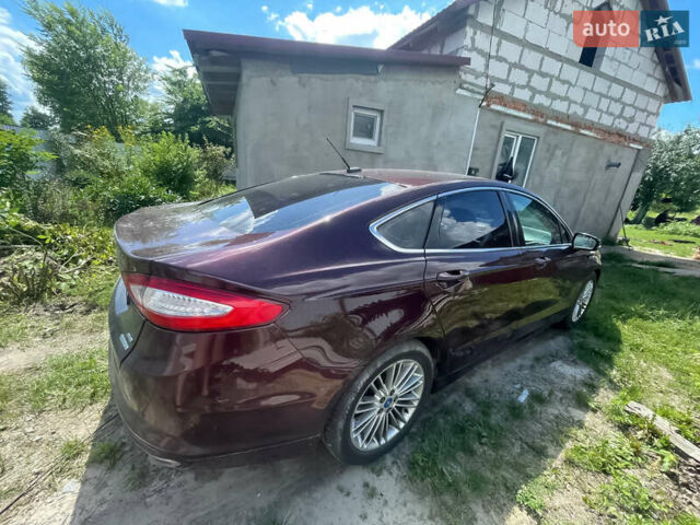 Красный Форд Фьюжн, объемом двигателя 2 л и пробегом 289 тыс. км за 8900 $, фото 3 на Automoto.ua