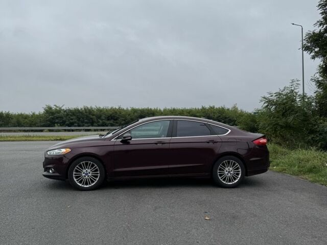 Красный Форд Фьюжн, объемом двигателя 2 л и пробегом 289 тыс. км за 8600 $, фото 5 на Automoto.ua