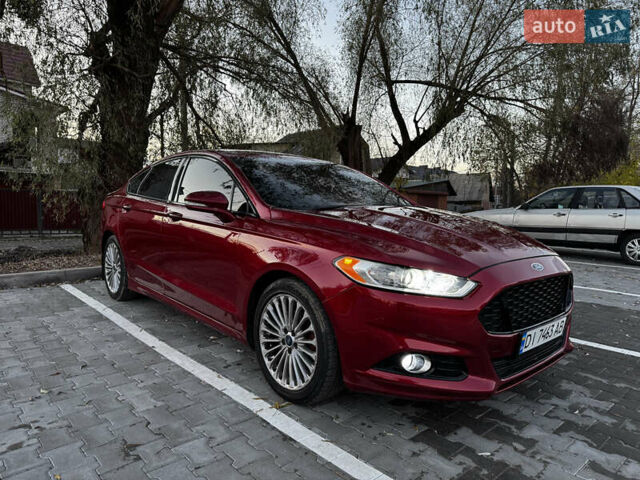 Червоний Форд Фьюжен, об'ємом двигуна 2 л та пробігом 169 тис. км за 10900 $, фото 2 на Automoto.ua
