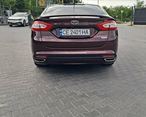 Красный Форд Фьюжн, объемом двигателя 2 л и пробегом 161 тыс. км за 10999 $, фото 6 на Automoto.ua