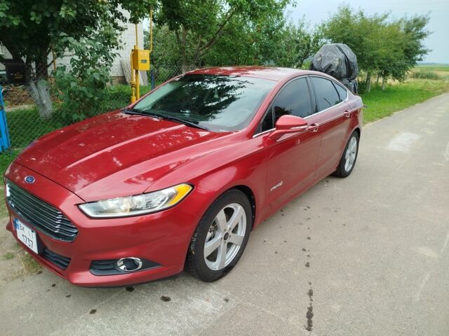 Червоний Форд Фьюжен, об'ємом двигуна 2 л та пробігом 258 тис. км за 11999 $, фото 9 на Automoto.ua