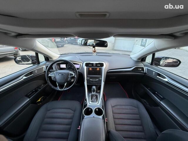 Червоний Форд Фьюжен, об'ємом двигуна 2 л та пробігом 209 тис. км за 8940 $, фото 12 на Automoto.ua