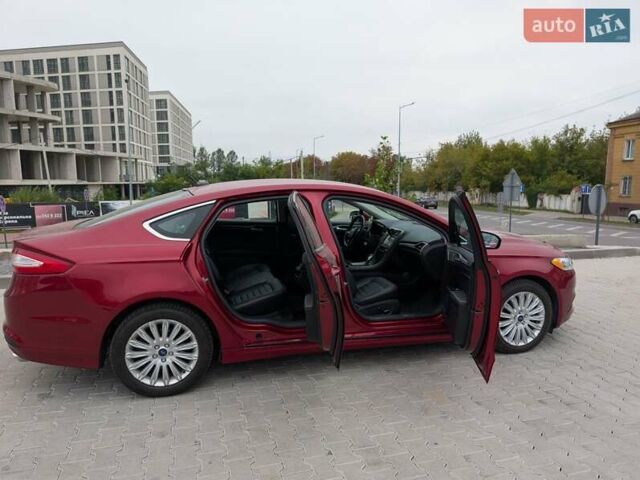 Красный Форд Фьюжн, объемом двигателя 2 л и пробегом 140 тыс. км за 12000 $, фото 5 на Automoto.ua