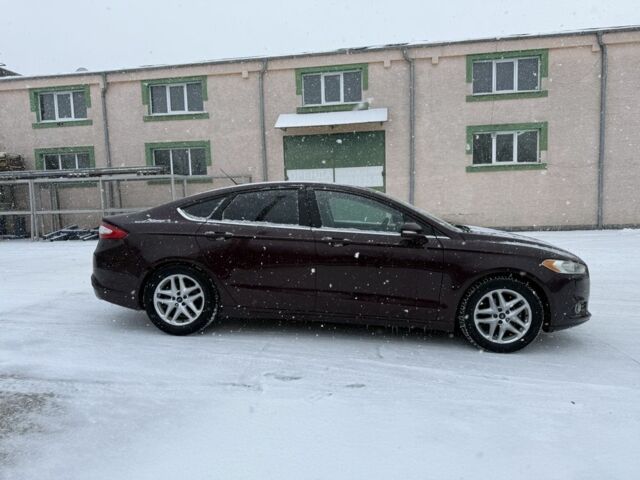 Червоний Форд Фьюжен, об'ємом двигуна 1.6 л та пробігом 240 тис. км за 5900 $, фото 2 на Automoto.ua