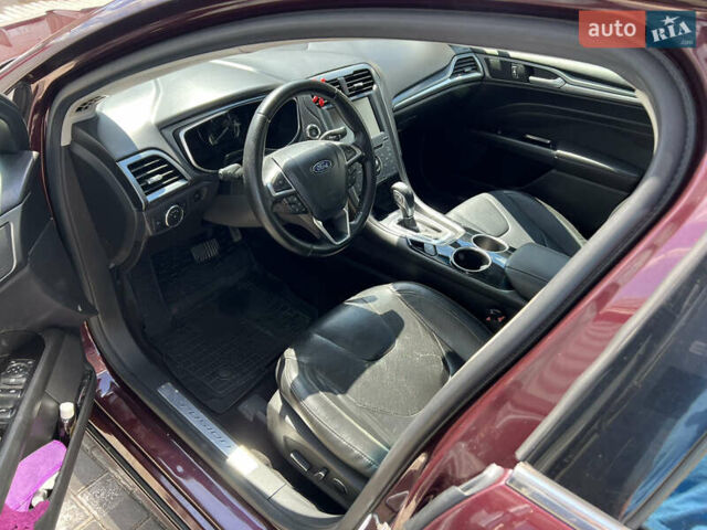 Красный Форд Фьюжн, объемом двигателя 2 л и пробегом 155 тыс. км за 12999 $, фото 8 на Automoto.ua