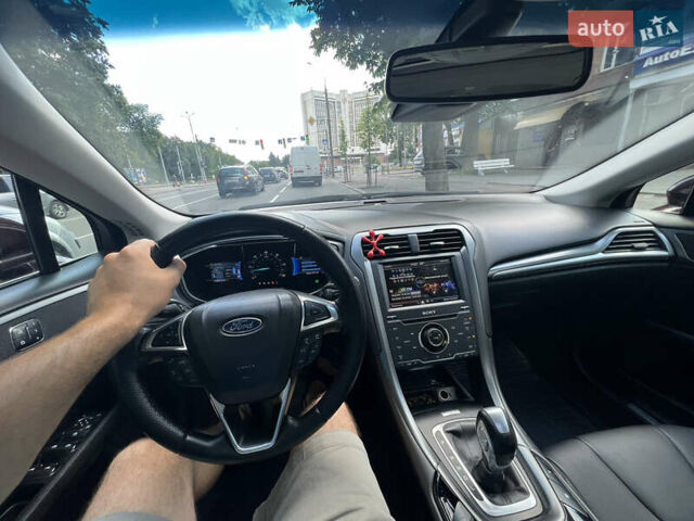 Красный Форд Фьюжн, объемом двигателя 2 л и пробегом 155 тыс. км за 12999 $, фото 12 на Automoto.ua