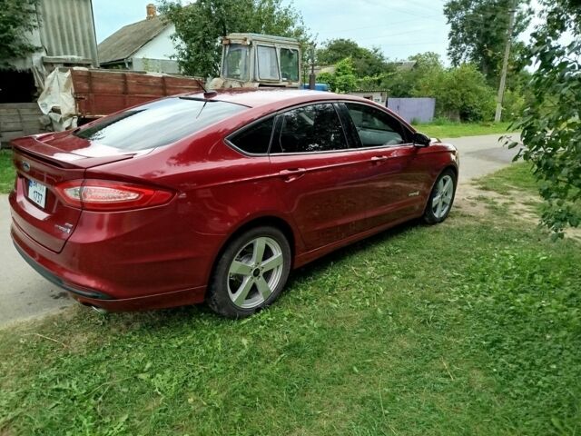 Червоний Форд Фьюжен, об'ємом двигуна 2 л та пробігом 258 тис. км за 11999 $, фото 7 на Automoto.ua