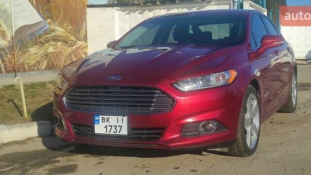 Красный Форд Фьюжн, объемом двигателя 2 л и пробегом 254 тыс. км за 12000 $, фото 8 на Automoto.ua