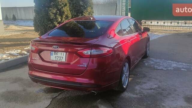 Красный Форд Фьюжн, объемом двигателя 2 л и пробегом 254 тыс. км за 12000 $, фото 2 на Automoto.ua