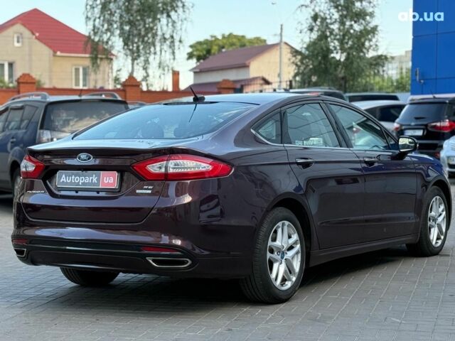 Червоний Форд Фьюжен, об'ємом двигуна 2 л та пробігом 209 тис. км за 8940 $, фото 5 на Automoto.ua