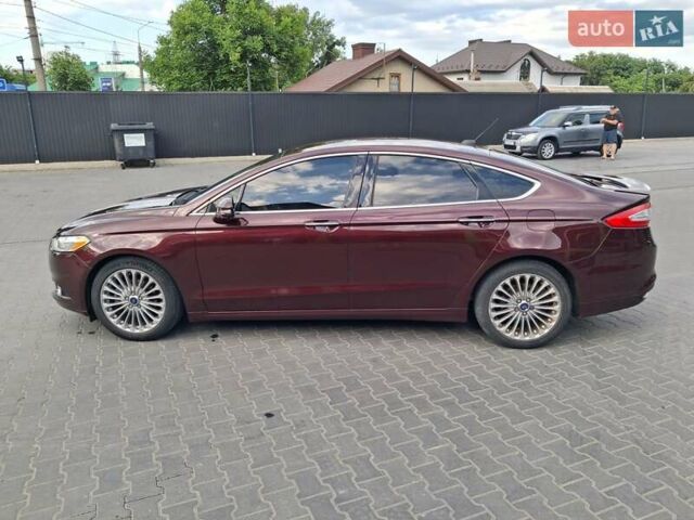 Красный Форд Фьюжн, объемом двигателя 2 л и пробегом 161 тыс. км за 10999 $, фото 7 на Automoto.ua