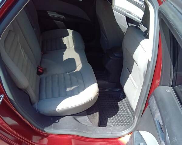 Красный Форд Фьюжн, объемом двигателя 2.4 л и пробегом 103 тыс. км за 9900 $, фото 3 на Automoto.ua