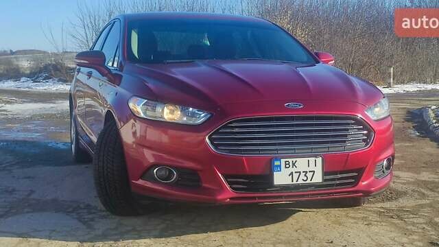 Красный Форд Фьюжн, объемом двигателя 2 л и пробегом 254 тыс. км за 12000 $, фото 6 на Automoto.ua